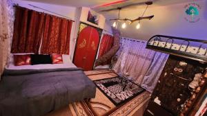 Ένα ή περισσότερα κρεβάτια σε δωμάτιο στο The 9th planet "Ecoliving Cult" +9 φωτογραφίες