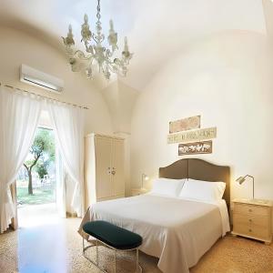 Postel nebo postele na pokoji v ubytování Casa Agrumeto 30