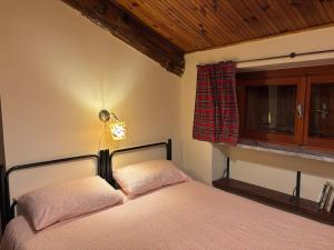 Postel nebo postele na pokoji v ubytování al Profilo di Napoleone