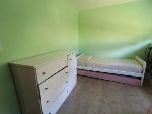 Ένα ή περισσότερα κρεβάτια σε δωμάτιο στο La Esquina