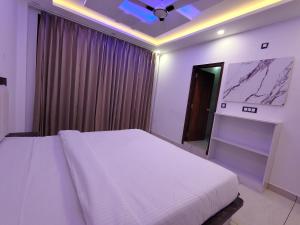 Ένα ή περισσότερα κρεβάτια σε δωμάτιο στο Heritage House Kasauli Hills +2 φωτογραφίες