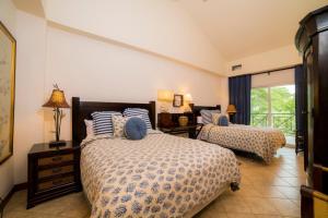 Un pat sau paturi într-o cameră la Veranda 2B - 3 bdr 3 bath