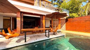 Πισίνα στο ή κοντά στο Villa Amrita - Oceanfront Villa with Private Beach