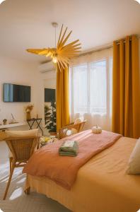 En eller flere senge i et værelse på Le Saint Charles