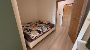 Ένα ή περισσότερα κρεβάτια σε δωμάτιο στο Homey 610 Apartment