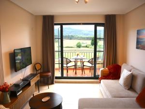 Et tv og/eller underholdning på Atico & Spa