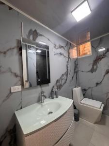 Ένα μπάνιο στο Apartamentos en la isla de Margarita