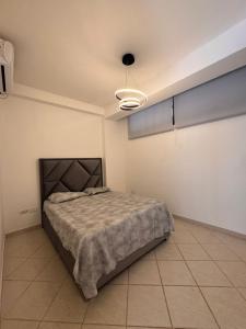 Ένα ή περισσότερα κρεβάτια σε δωμάτιο στο Apartamentos en la isla de Margarita