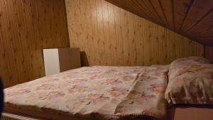 Postel nebo postele na pokoji v ubytování AVS Snagov Chalet