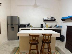 Kuchyň nebo kuchyňský kout v ubytování Chulel Hotel Origen