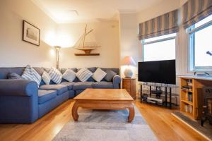 TV a/nebo společenská místnost v ubytování Golf Court No 5 - Elie