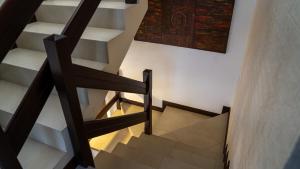 a staircase in a house with a stair case at Vacaciones Seguras -Conjunto Privado -Jacuzzi  +20 photos
