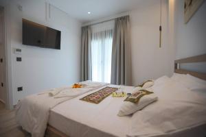 Φωτογραφία από το άλμπουμ του Ammos Little Escape στην Αβδού