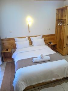 Giường trong phòng chung tại Les Chalets du Voyageur