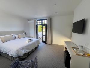 Ένα ή περισσότερα κρεβάτια σε δωμάτιο στο Nomad Small Hotel +9 φωτογραφίες