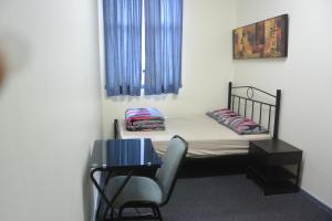 Postel nebo postele na pokoji v ubytování Elizabeth Hostel