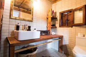 Koupelna v ubytování Endeavour Beach luxury Holiday Cabin