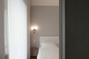 Postel nebo postele na pokoji v ubytování Lidia Chambres D'hotes