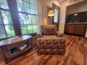 Et opholdsområde på The Groveland Cottage