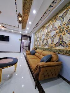 Μια τηλεόραση ή/και κέντρο ψυχαγωγίας στο CARAVAN PLAZA INN Boutique