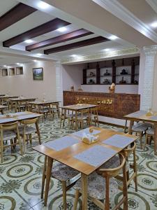 Εστιατόριο ή άλλο μέρος για φαγητό στο CARAVAN PLAZA INN Boutique