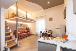 a kitchen and living room with a loft conversion at Casa Imperati in Agerola