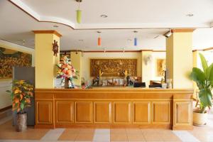 The lobby or reception area at โรงแรมพิมายบุรี Phimaiburi Apartment