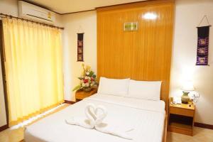 A room at โรงแรมพิมายบุรี Phimaiburi Apartment