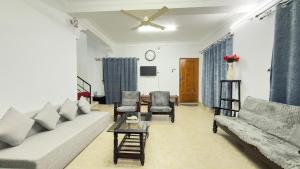 Et opholdsområde på Casa Red Homestay