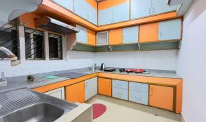 Køkken eller tekøkken på Casa Red Homestay