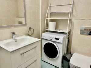 Et badeværelse på Unirea Luxury Residence