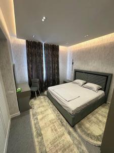 Ένα ή περισσότερα κρεβάτια σε δωμάτιο στο Mekhtarr Anbar Historical Hotel +19 φωτογραφίες