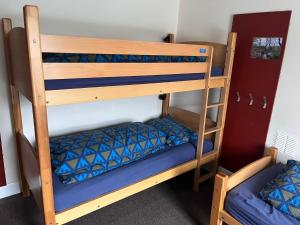 a couple of bunk beds in a room at Tobermory Youth Hostel in Tobermory