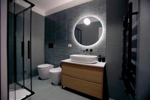 Koupelna v ubytování Garibaldi living + 8 fotografií