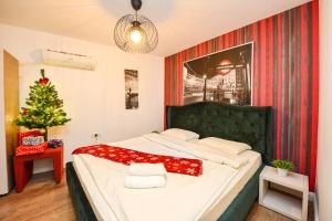 Postel nebo postele na pokoji v ubytování Bucharest City Center Suites + 163 fotografií