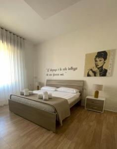 Ένα ή περισσότερα κρεβάτια σε δωμάτιο στο B&B Le due sorelle +18 φωτογραφίες