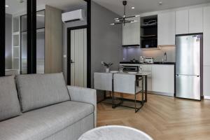 Køkken eller tekøkken på Новые апартаментыTitle Legendary