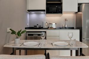 Køkken eller tekøkken på Новые апартаментыTitle Legendary