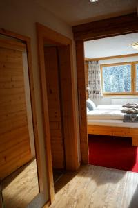 Postel nebo postele na pokoji v ubytování MBZ Birg 1414 + 3 fotografie