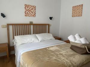 Una cama o camas en una habitación de Hotel Carabela La Pinta