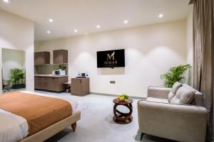 Kuchyň nebo kuchyňský kout v ubytování Miran Hotel & Suites - Mathura Road Faridabad