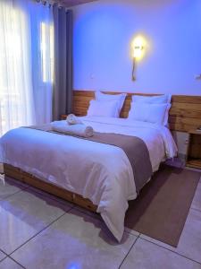 Giường trong phòng chung tại Les Chalets du Voyageur +5 ảnh