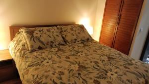 En eller flere senge i et værelse på Apartamenty Rudzka