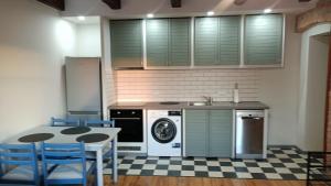 Køkken eller tekøkken på Apartamenty Rudzka + 2 billeder