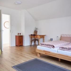 Ένα ή περισσότερα κρεβάτια σε δωμάτιο στο Lemp's Genussgarten