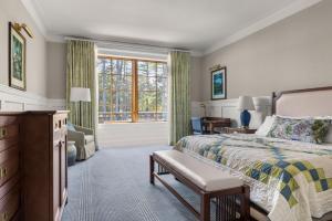 En eller flere senge i et værelse på The Lake Estate on Winnisquam