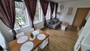 Et opholdsområde på Apartmán ELEVEN