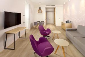 Телевизор и/или развлекательный центр в Radisson Blu Resort & Spa +215 фотографий