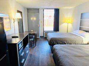 Una cama o camas en una habitación de Newnan Nook