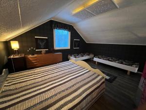 Ένα ή περισσότερα κρεβάτια σε δωμάτιο στο Villa Rosa by the River Teno